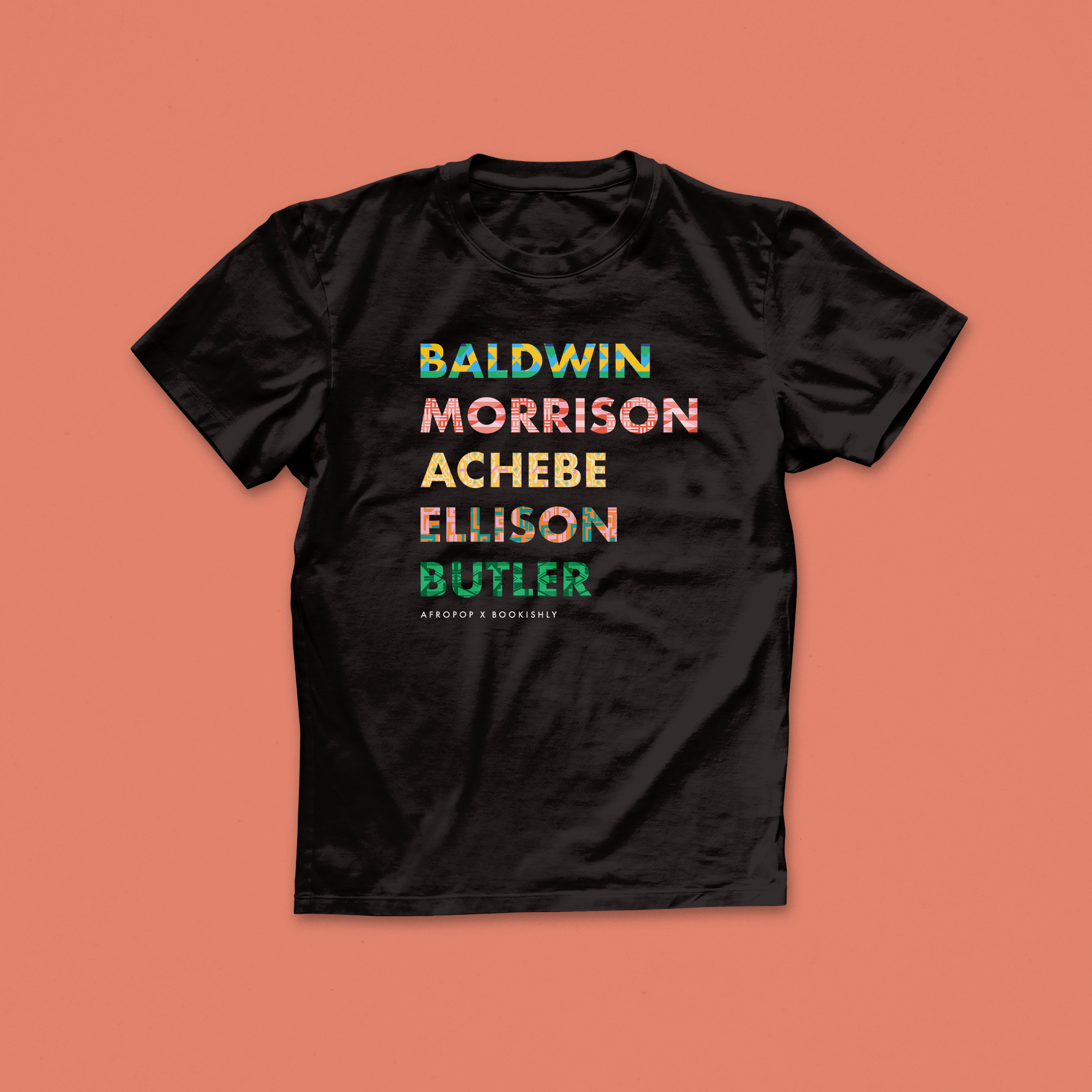 Black Authors T-shirt with bold, colourful patterned names of Baldwin, Morrison, Achebe, Ellison, and Butler on a black tee, part of Afropop x Bookishly collab