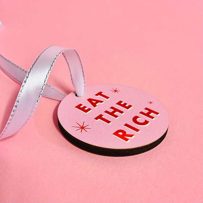 Bookish Christmas Tree decoration. Eat the Rich Activist. Mix and Match available. Bright pink retro design. Colourful Christmas Tree Decor. Activism Christmas Decor. Political Gifts. Perfect for book lovers, bookworms, bibliophiles and readers. Feminist festive hanging ornaments.