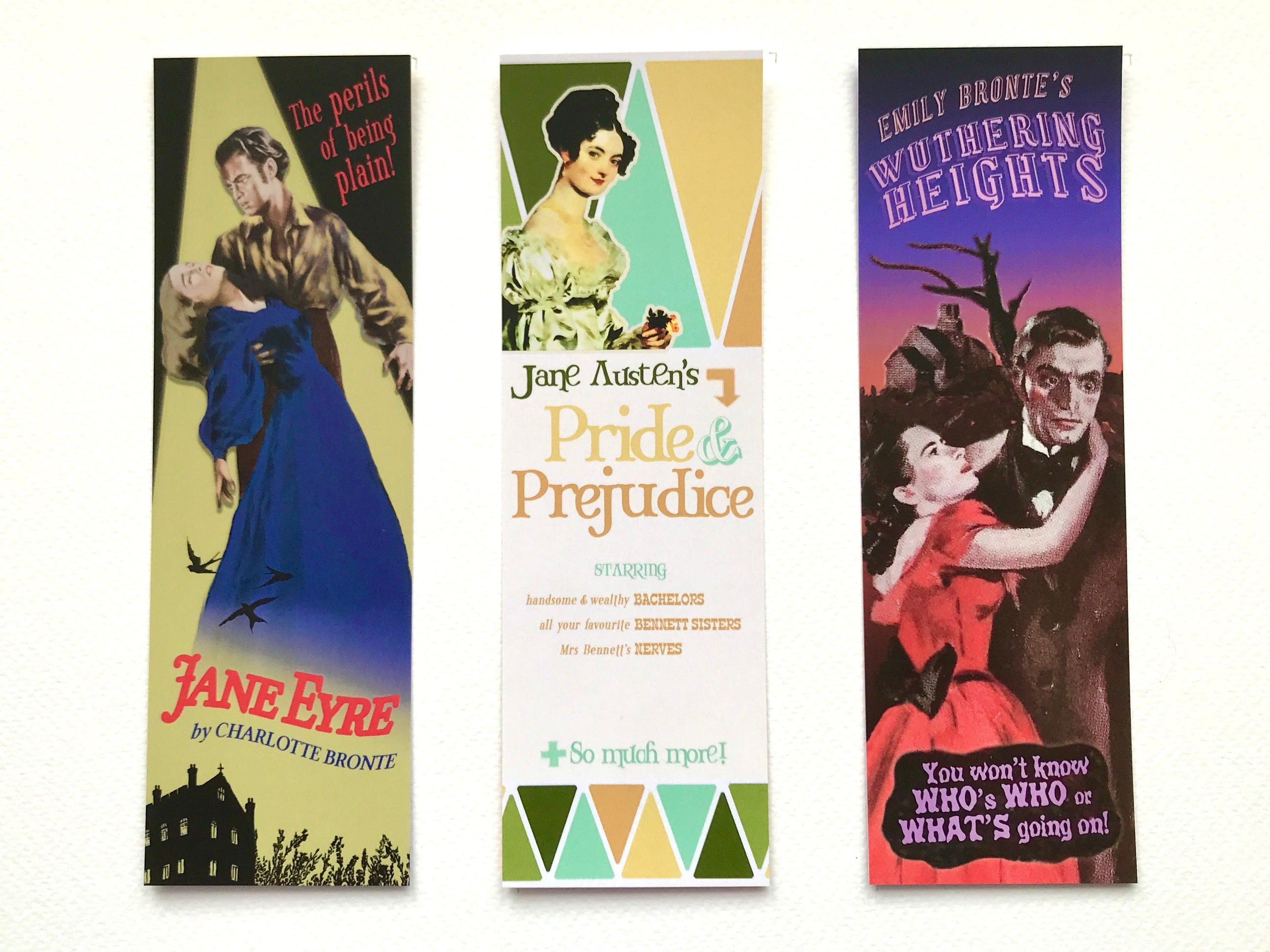 Set of three classic novel bookmarks styled as vintage pulp covers featuring Jane Eyre, Pride and Prejudice and Wuthering Heights