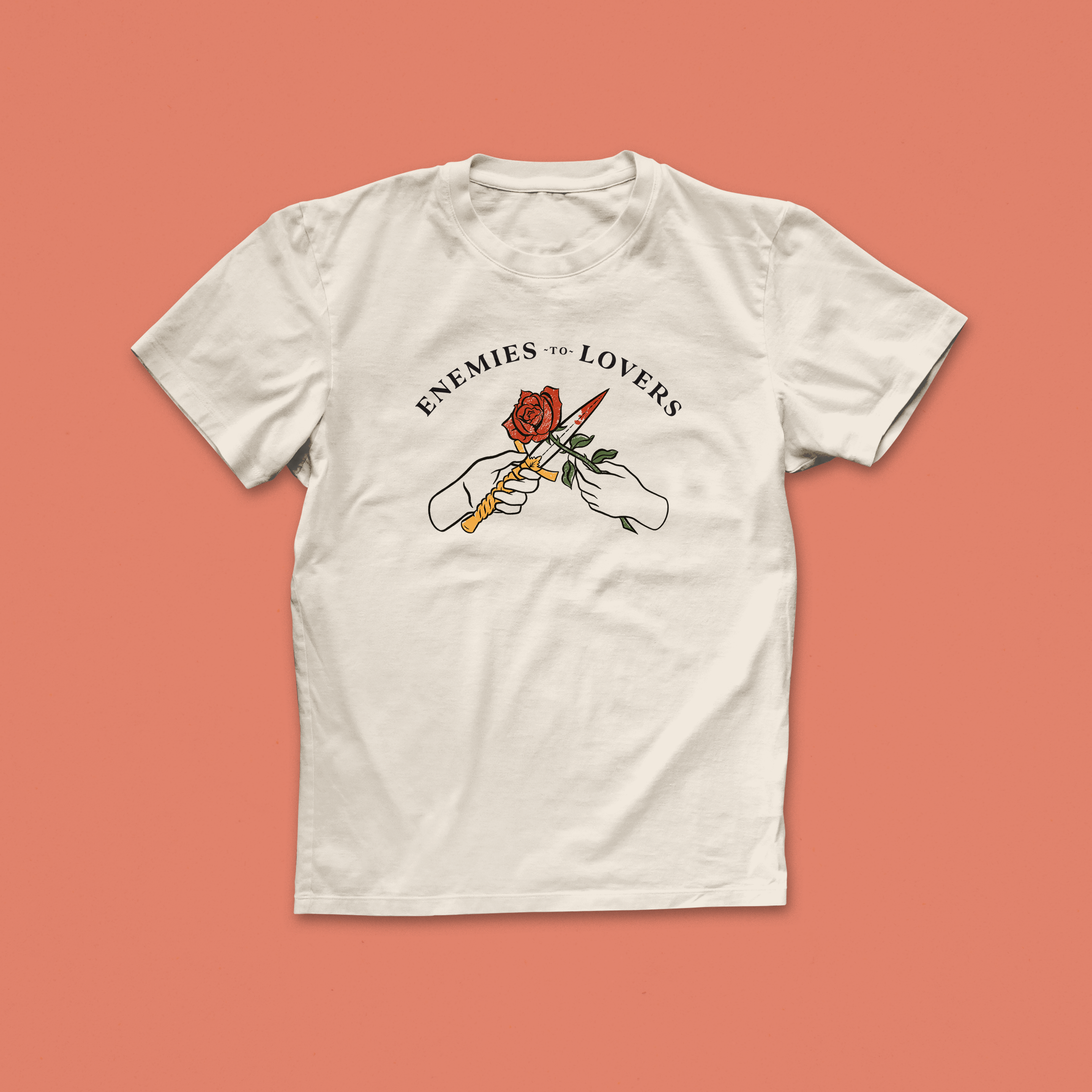 Enemies to Lovers T-shirt with illustrated hands holding a rose and dagger, bookish romance trope tee for readers and fiction fans