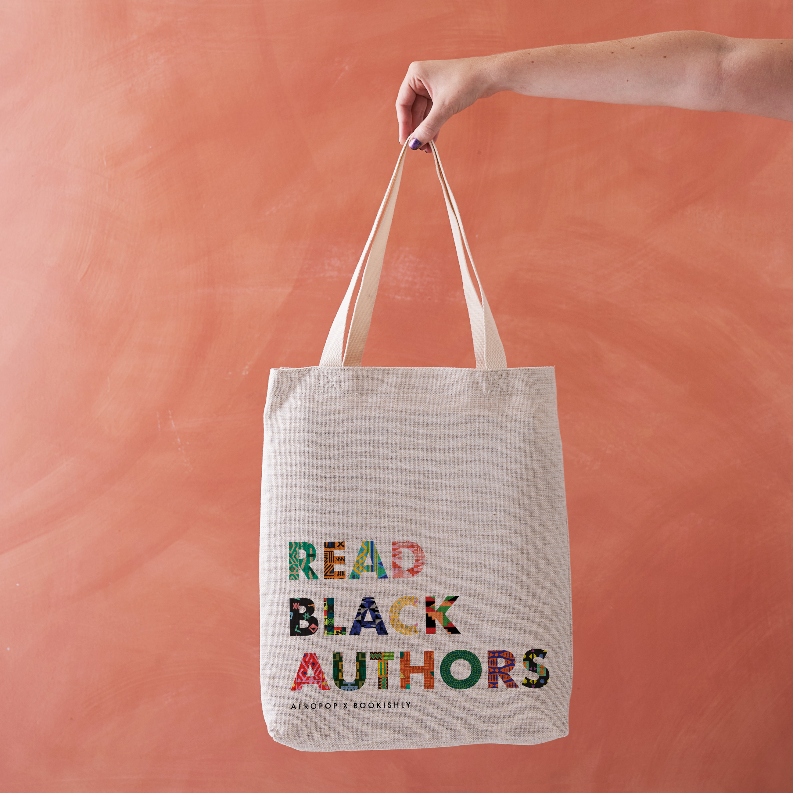 Read Black Authors tote bag, designed in collaboration with Afropop. Featuring block text with patterns inspired by African Heritage. Gifts for Book lover, bookworms, readers and bibliophiles. In support of black history month.