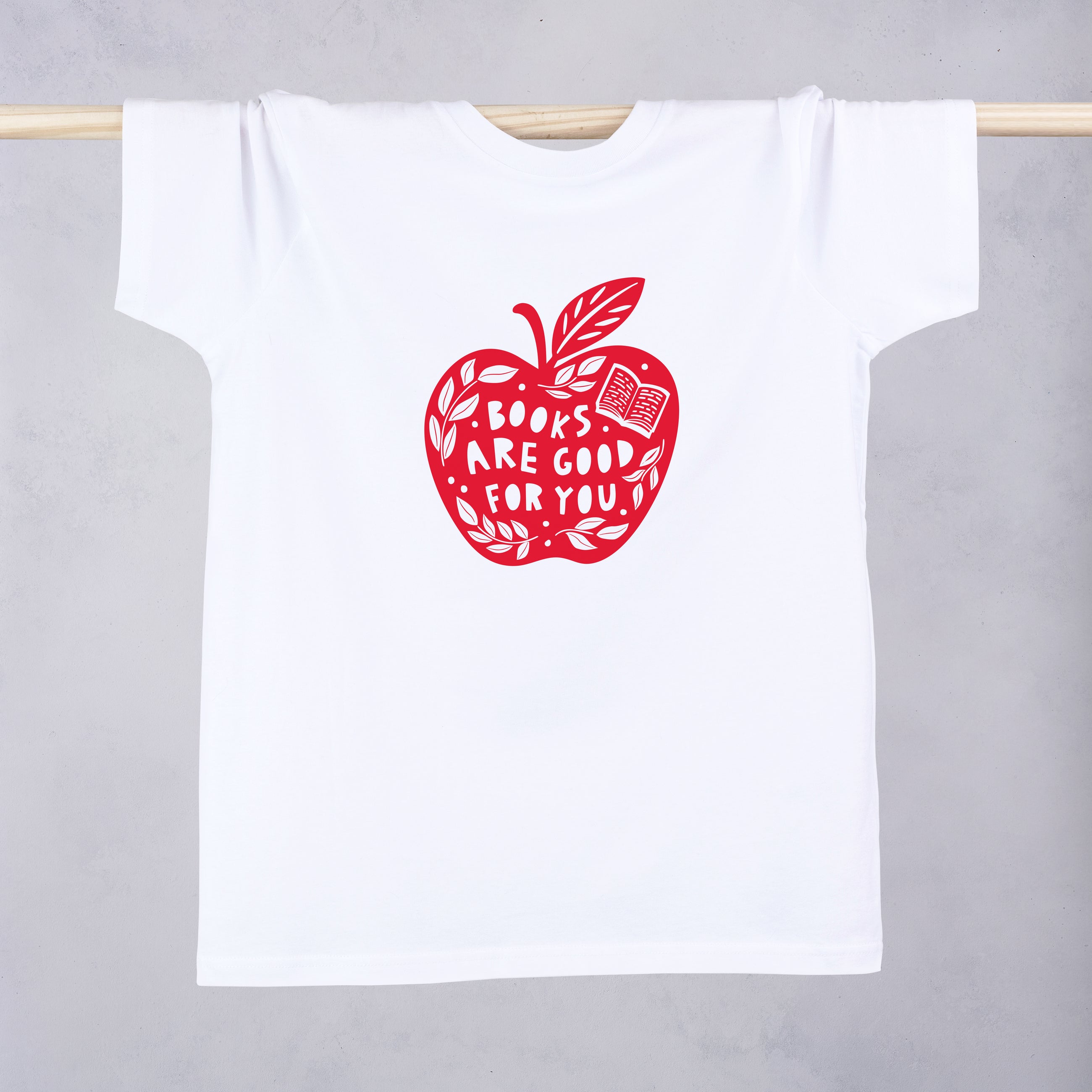 Books are good for you. Literary Activist t-shirt. Clothing for book lover, bookworms, readers and bibliophiles. Educational clothing. Red Apple. Power of reading. Bookishly.
