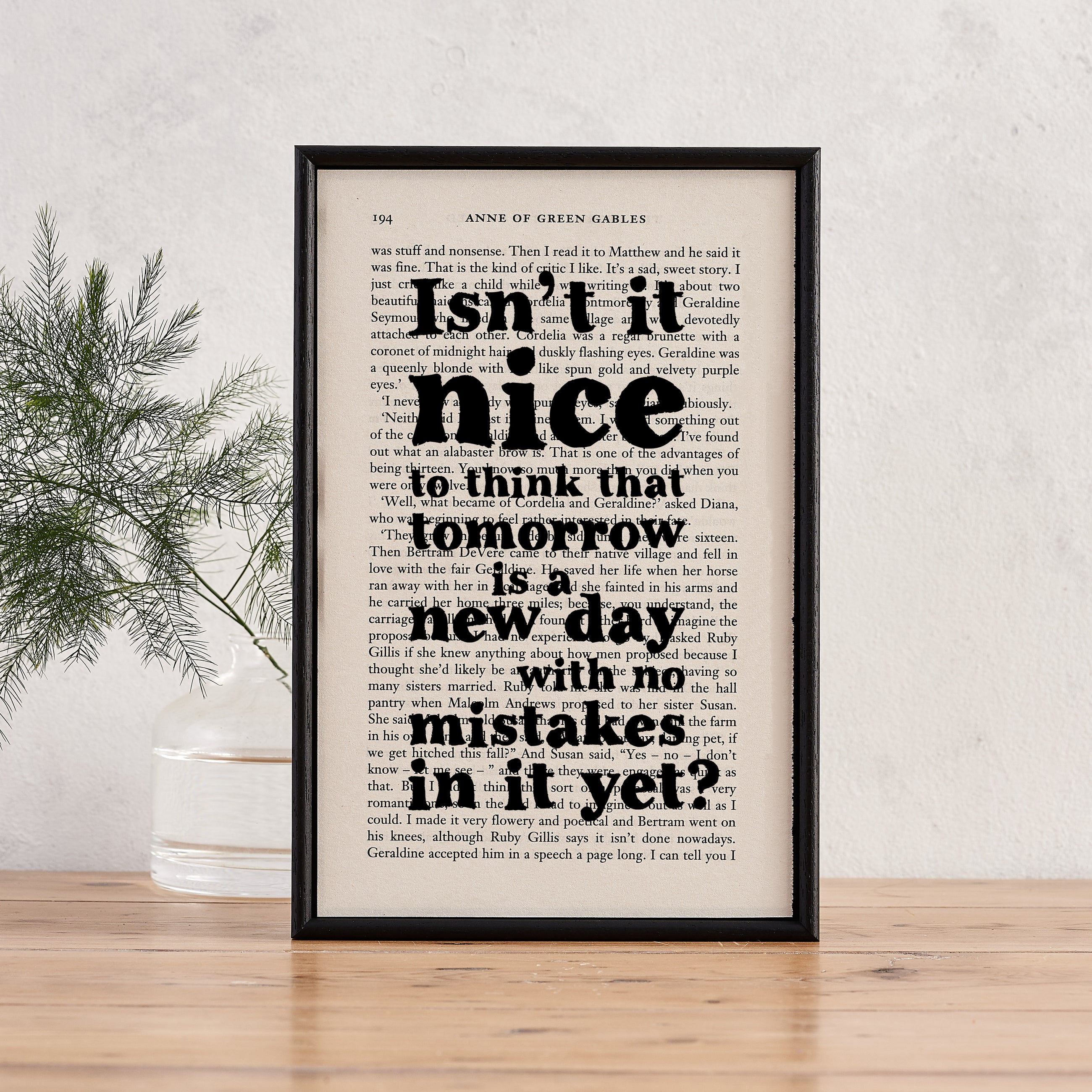 Framed book page print with the quote “Isn’t it nice to think that tomorrow is a new day with no mistakes in it yet?” from Anne of Green Gables.