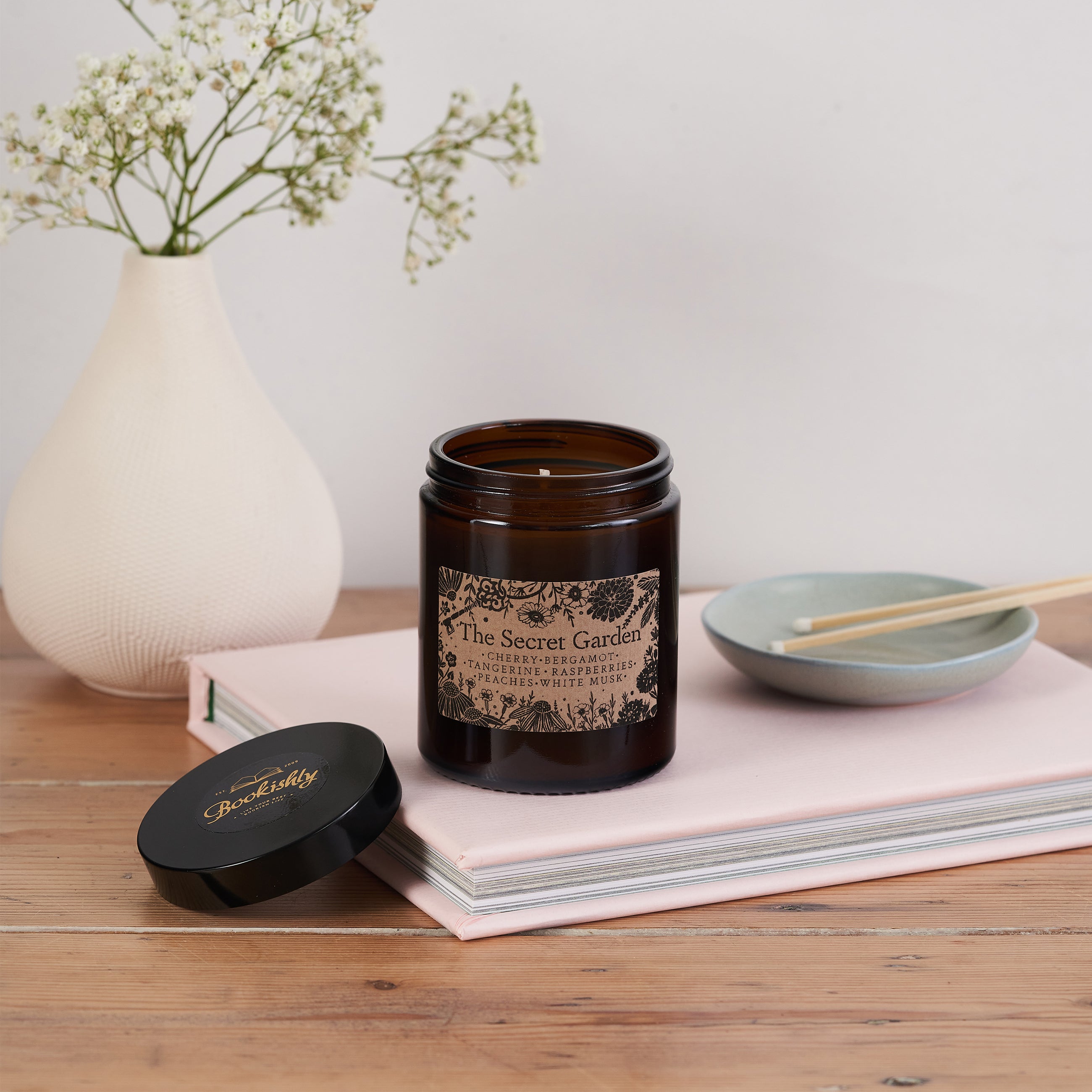 Luxury Vegan Candle. Soy wax Candle. Bookish Candle. Amber apothecary style jar. Apothecary. Hand Poured Signature Candle. Natural soy wax. Classic Literature. Reading Candle. Mary Lennox. The Secret Garden. Floral Candle. Florist. Gifts for Gardeners. Plants. Flowers. Frances Hodgson Burnett.