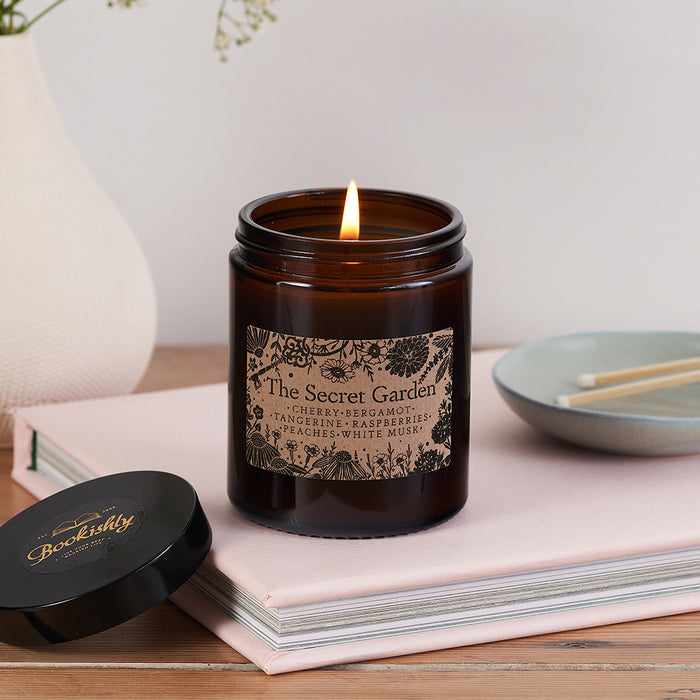 Luxury Vegan Candle. Soy wax Candle. Bookish Candle. Amber apothecary style jar. Apothecary. Hand Poured Signature Candle. Natural soy wax. Classic Literature. Reading Candle. Mary Lennox. The Secret Garden. Floral Candle. Florist. Gifts for Gardeners. Plants. Flowers. Frances Hodgson Burnett.