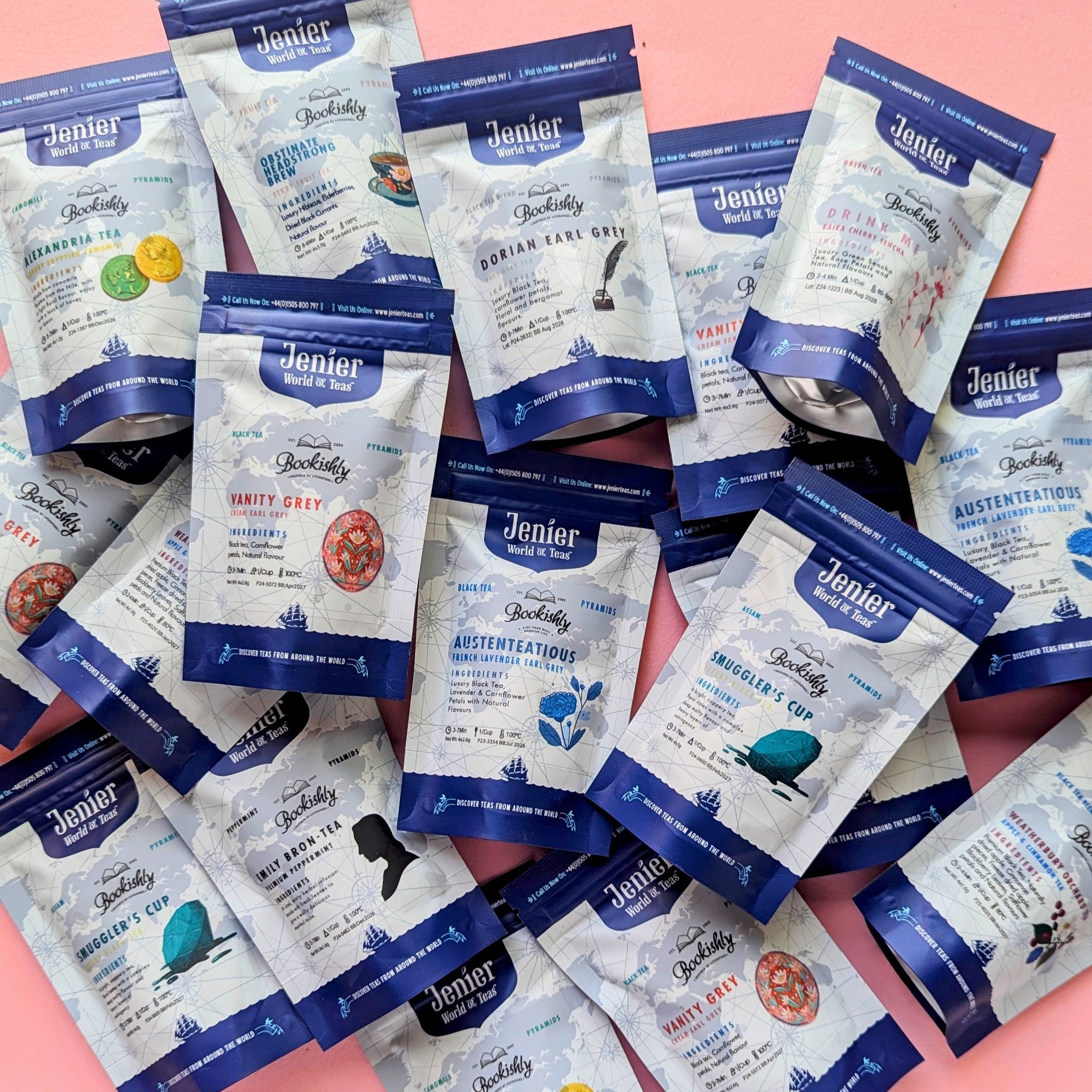 Assorted Bookishly literary teabag sachets inspired by classic books, scattered on a pink background.