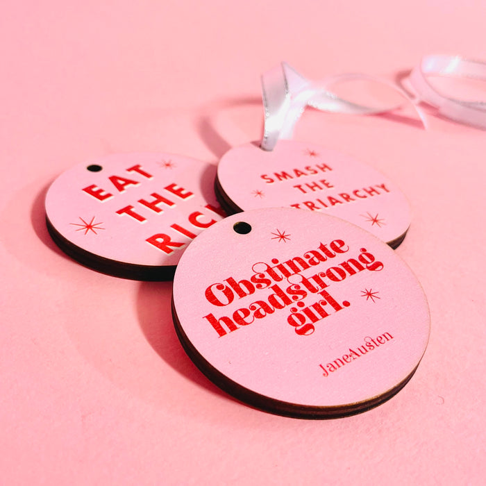 Bookish Christmas Tree decoration set of 3. Mix and Match available. Bright pink retro design. Colourful Christmas Tree Decor. Obstinate Headstrong Girl by Jane Austen. Perfect for book lovers, bookworms, bibliophiles and readers. Feminist festive hanging ornaments.