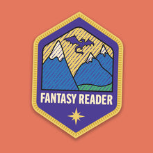 “Fantasy Reader” sticker designed like a stitched merit badge, featuring a mountain range illustration on a richpurple background.
