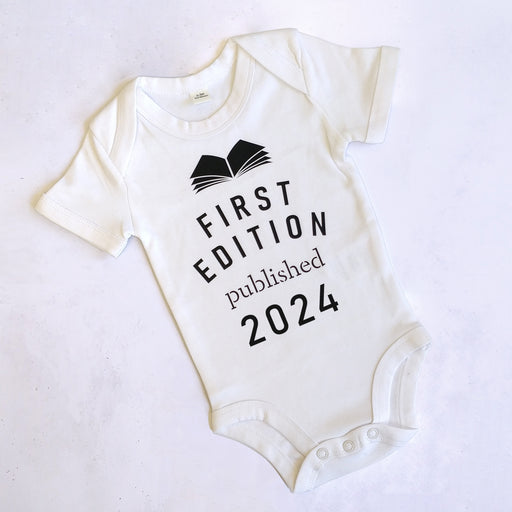 'First Edition published 2024' Bookish Babygrow for literature loving new parents. Baby clothes for book lover, bookworm, reader and bibliophiles.
