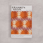 Bookishly edition of Frankenstein by Mary Shelley with a red and orange patterned dust jacket and personalised message printed on the front cover.