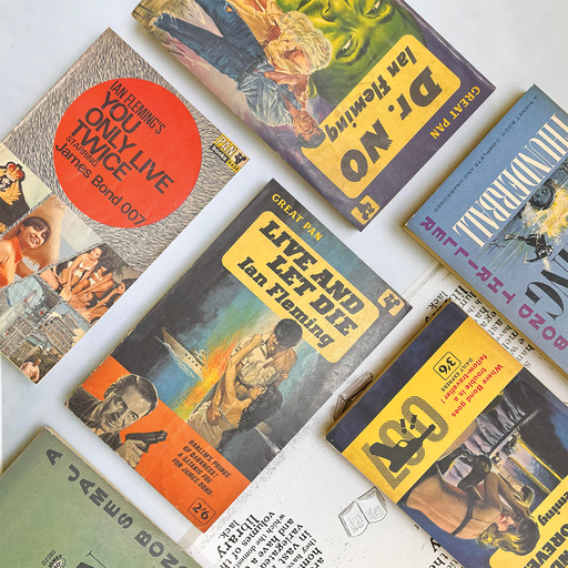 James Bond Mini Library. Bond Book Collectors. Vintage James Bond Books. Featuring Live and Let Die. Dr No. You only Live Twice. Thunderball. Action Books. Gifts for book lover, bookworm, reader and bibliophile. Bookishly.