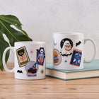 White ceramic mug with a colorful wrap-around collage of Halloween and bookish art.