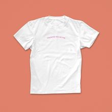 The Book Was Better T-shirt with minimalist curved pink text – subtle and funny tee for literary purists and book lovers