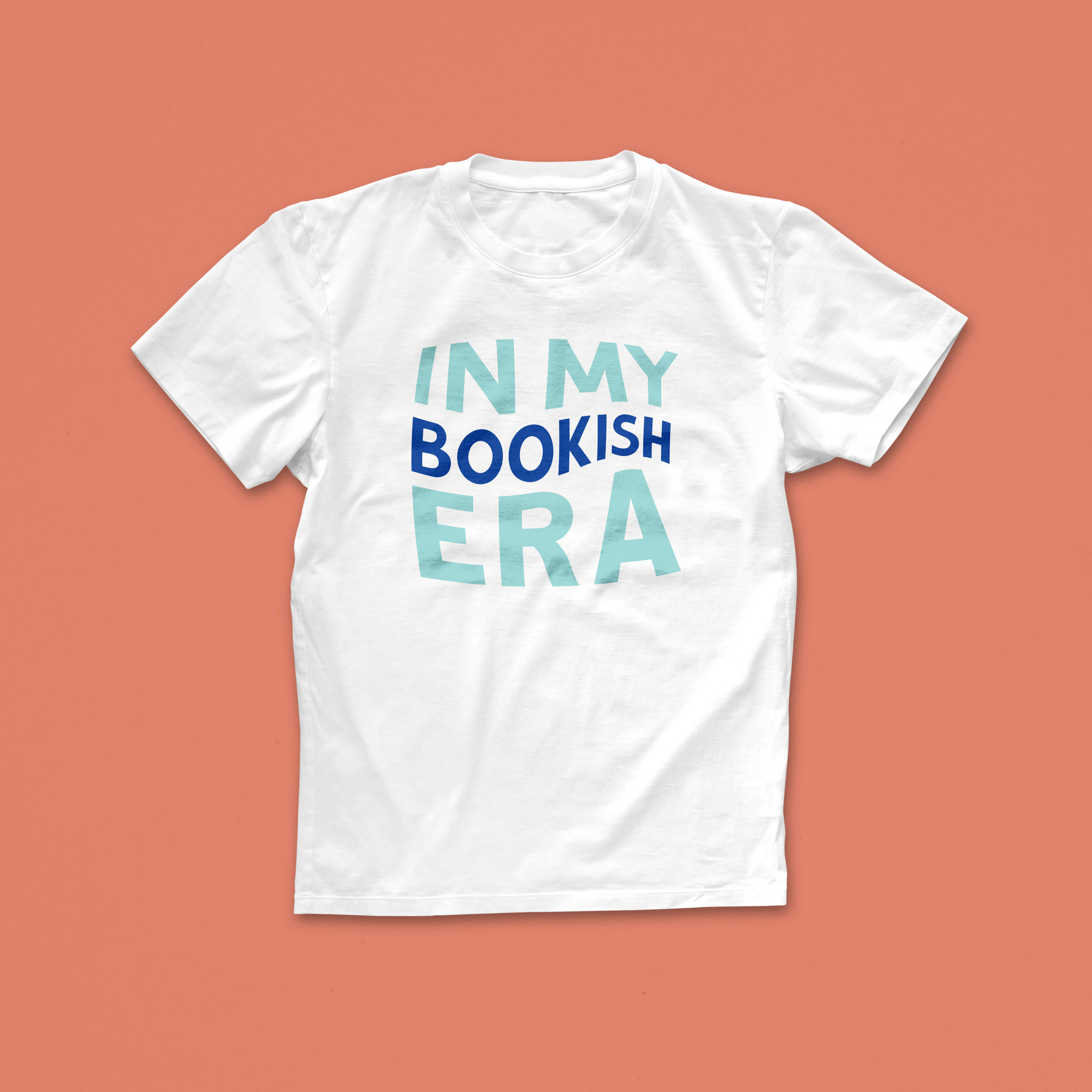 In My Bookish Era T-shirt with bold pastel and blue lettering – a playful bookish tee inspired by reading phases and pop culture trends