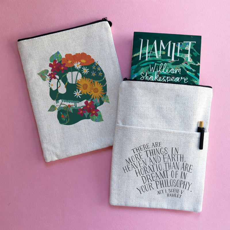 Hamlet book sleeve with floral skull illustration and Shakespeare quote, holding a paperback book