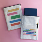 Bookshops Not Billionaires book sleeve made from linen-effect fabric on a pink background