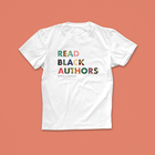 Read Black Authors white T-shirt featuring bold, patterned text in African-inspired colours from the Afropop x Bookishly collection