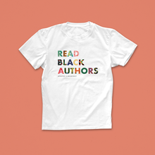 Read Black Authors white T-shirt featuring bold, patterned text in African-inspired colours from the Afropop x Bookishly collection
