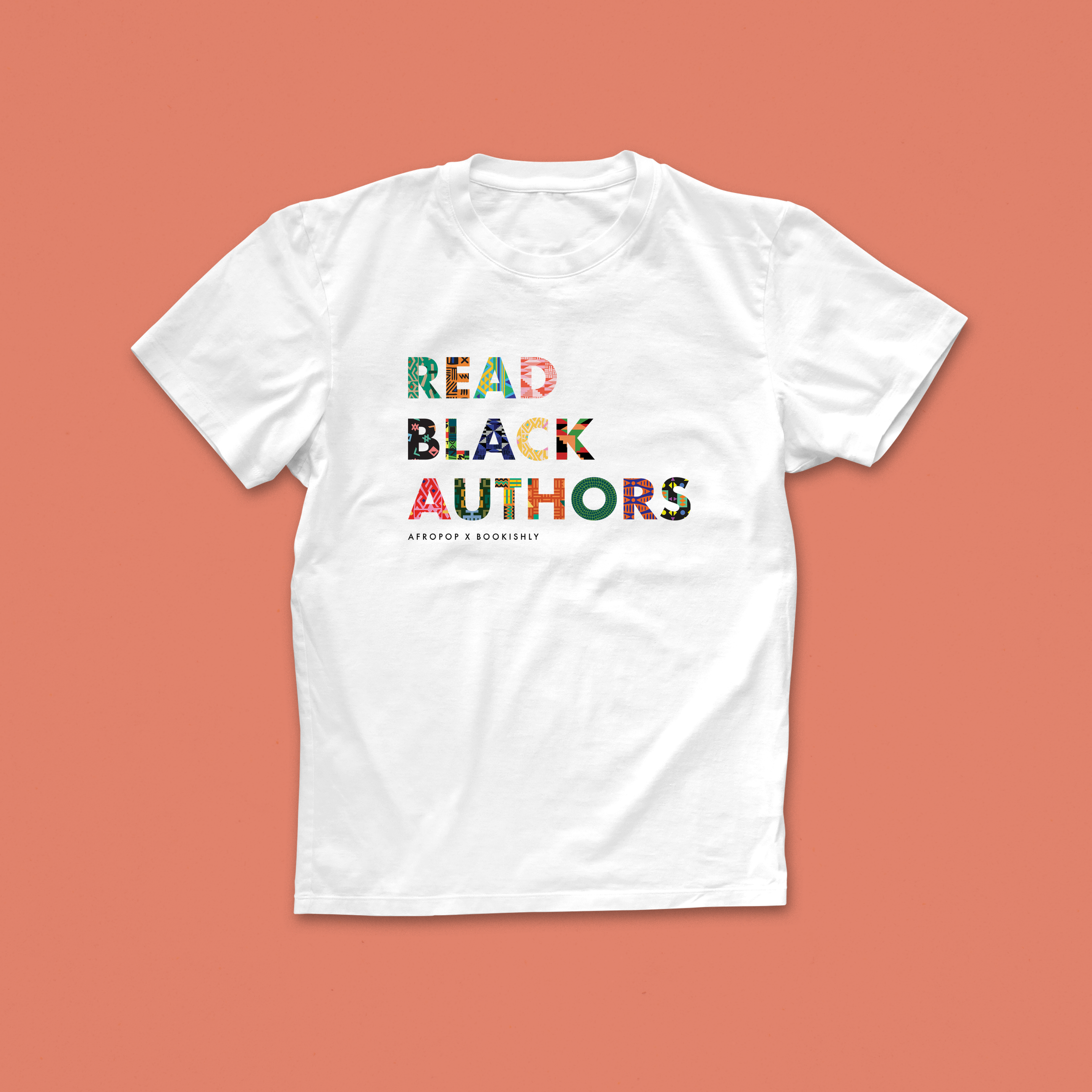 Read Black Authors white T-shirt featuring bold, patterned text in African-inspired colours from the Afropop x Bookishly collection