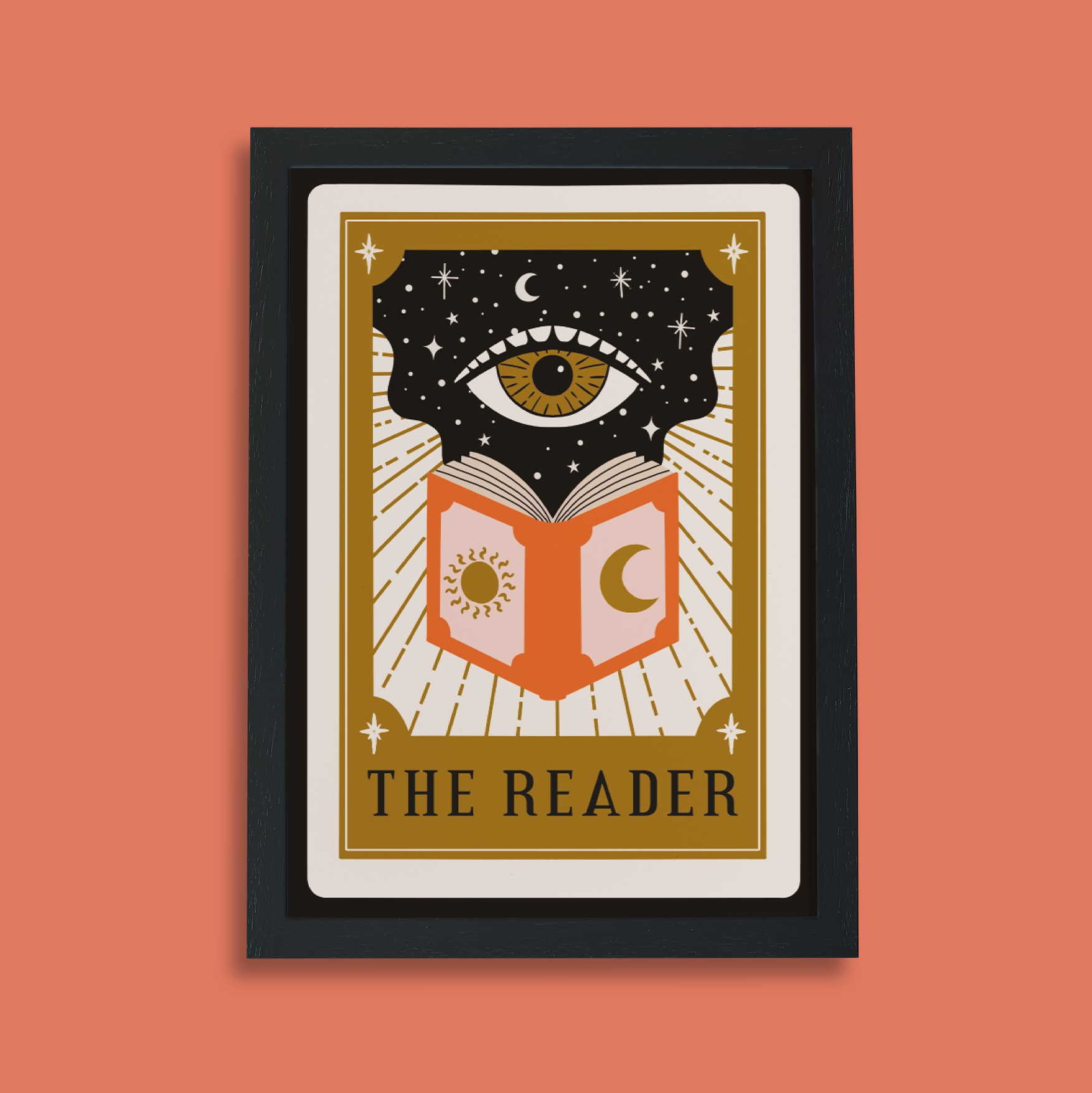Framed art print with tarot card design showing an eye above an open book with sun and moon symbols, titled “The Reader.”