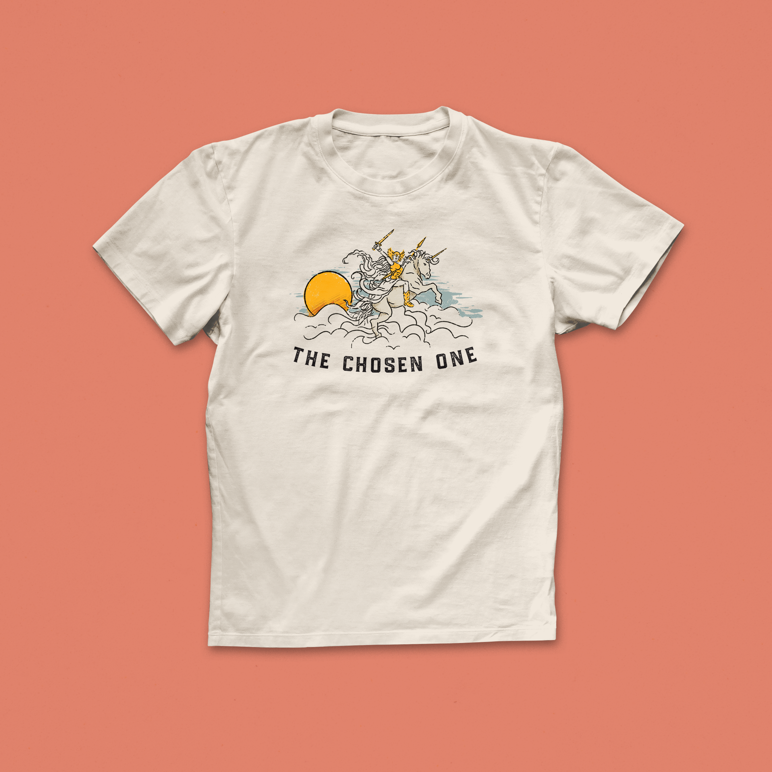 The Chosen One T-shirt with whimsical illustrated design of a unicorn rider holding a sword, rising through clouds, fantasy-inspired reader tee