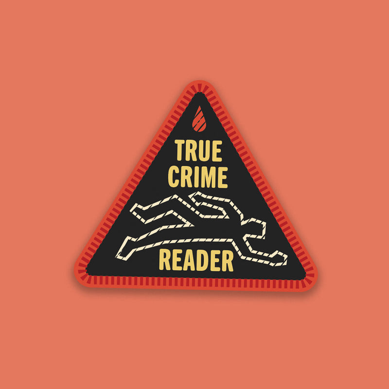 “True Crime Reader” sticker designed like a red and black stitched merit badge, with a chalk outline illustration on a black background.
