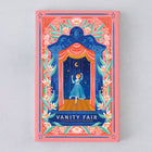 Flatlay of Vanity Fair by William Makepeace Thackeray, Bookishly edition with illustrated dust jacket