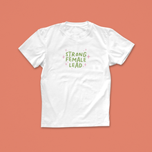 Strong Female Lead T-shirt with green and pink hand-drawn lettering and sparkles, designed for feminist readers and book lovers