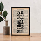 Framed book page print featuring the quote “All the world’s a stage. And all the men and women merely players” printed in bold black type on a page from The Complete Works of William Shakespeare.