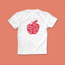 Books Are Good For You T-shirt with red apple and book illustration, featuring hand-lettered text, designed for book lovers and readers
