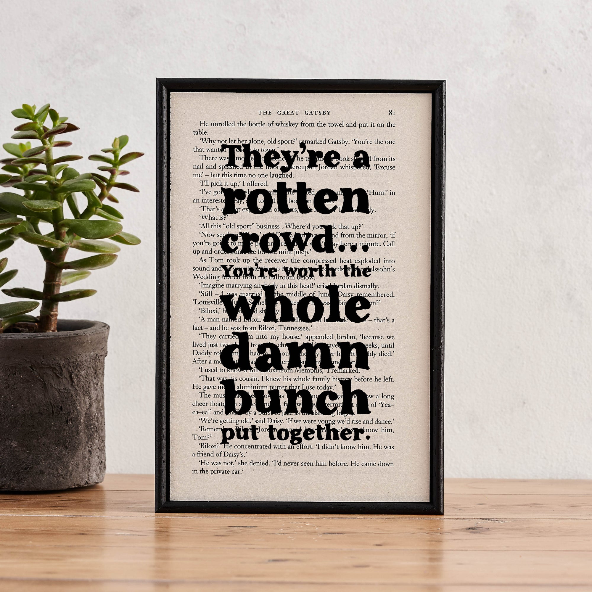 Framed book page print featuring the quote “They’re a rotten crowd... You’re worth the whole damn bunch put together” from The Great Gatsby