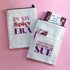 Personalised book sleeve featuring “In My Spicy Era” design on one side and “This Book Belongs To Sue” on the other, styled on a pink background with a copy of Lady Chatterley’s Lover.