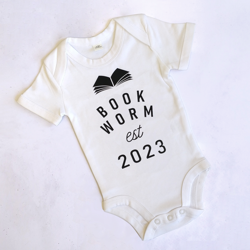 'Bookworm Est 2023' Babygrow for literature loving parents. 