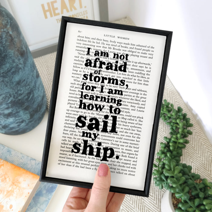 I am not afraid of storms for I am learning how to sail my ship. Positive and uplifting quote from Little Women by Louise May Alcott. Home decor for readers. Perfect for book lovers, bookworms, bibliophiles and readers.