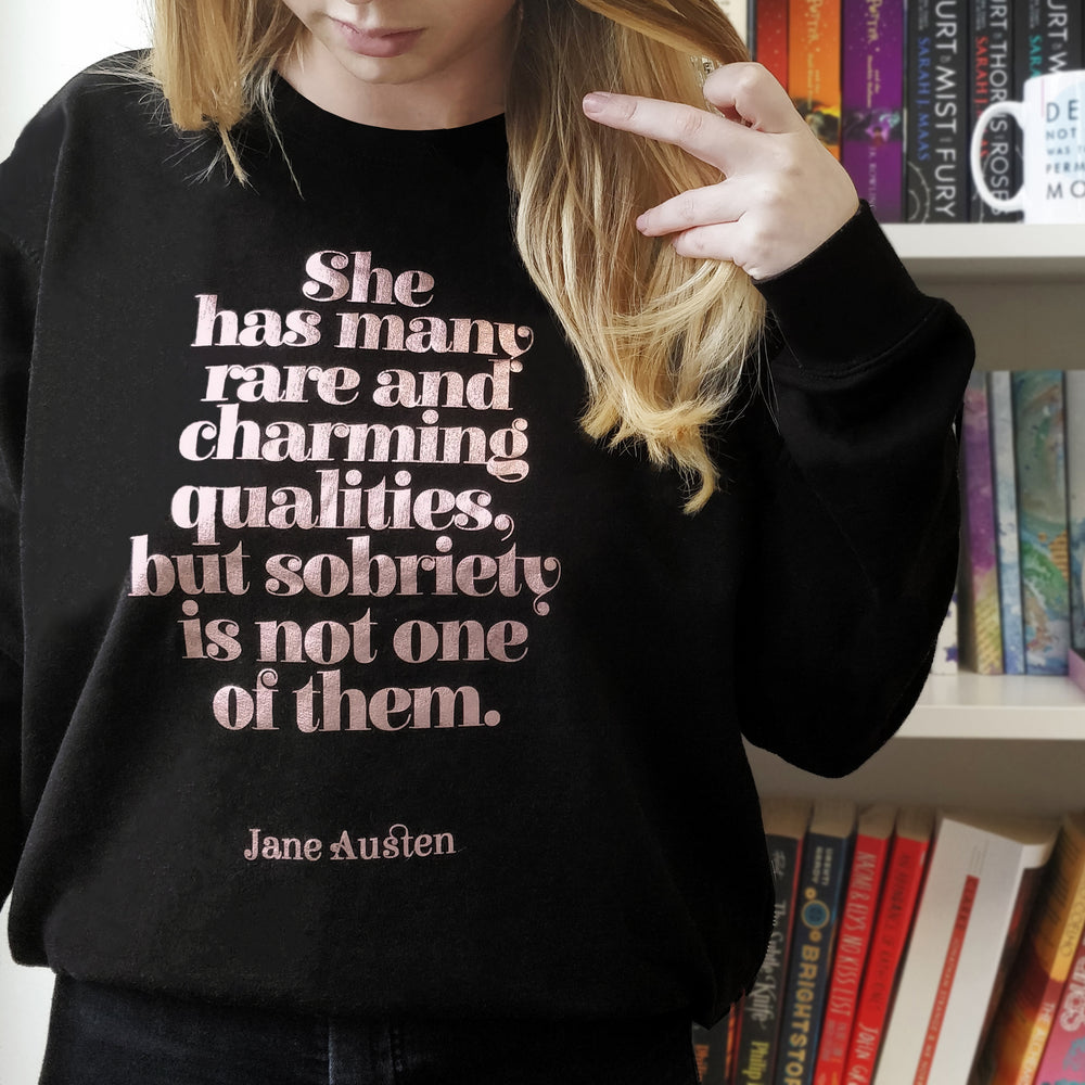 She has many rare and charming qualities, but sobriety is not one of them | Jane Austen Slogan Jumper.