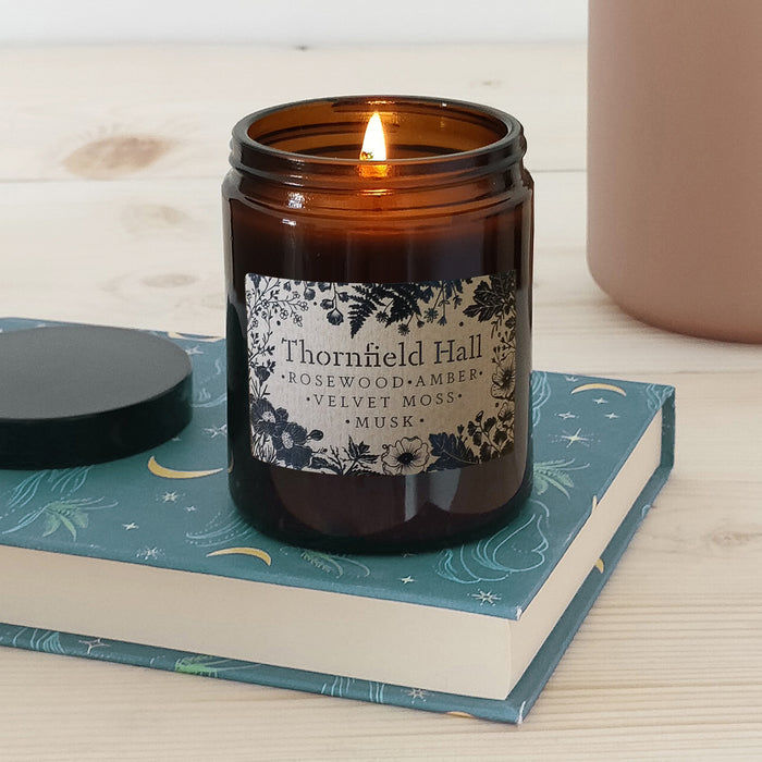 Luxury Vegan Candle. Soy wax Candle. Bookish Candle. Amber apothecary style jar. Apothecary. Hand Poured Signature Candle. Natural soy wax. Classic Literature. Reading Candle. Thornfield Hall. Jane Eyre by Charlotte Brontë. Mr Rochester.