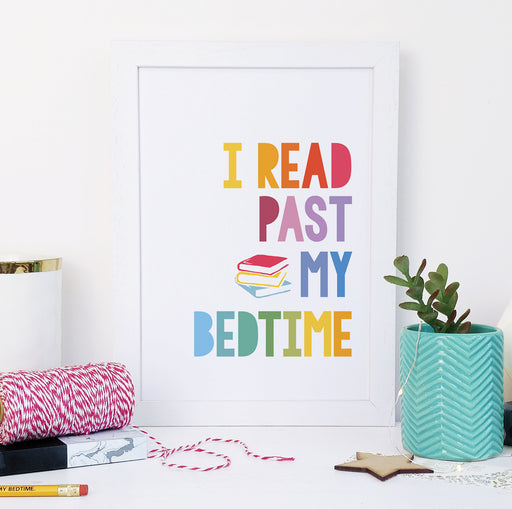 “I read past my bedtime.” Rainbow Book Lover Framed Print