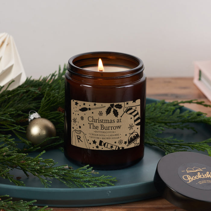 Luxury Vegan Candle. Soy wax Candle. Bookish Candle. Amber apothecary style jar. Apothecary. Hand Poured Signature Candle. Natural soy wax. Classic Literature. Reading Candle. Harry Potter. The Burrow. Christmas at The Burrow. The Weasleys. Christmas Gifts. Potter Fans. Hogwarts.