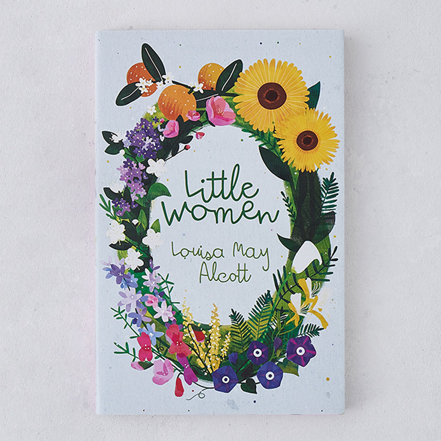 Flatlay of Little Women by Louisa May Alcott, Bookishly edition with exclusive illustrated dust jacket