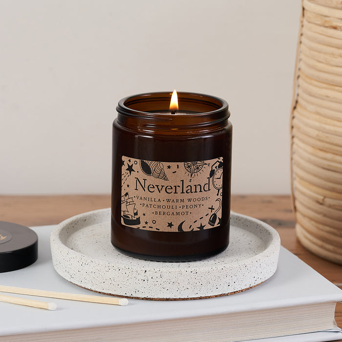 Luxury Vegan Candle. Scented Soy wax. Bookish Candle. Amber apothecary style jar. Apothecary. Hand Poured Signature Candle. Classic Literature. Bibliophile. Bookworm. Novel. Book lover. Reading accessories. Gifts for her. Gifts for him. Gifts for them. Christmas Gifts. Neverland. Fictional location. Peter Pan. Childhood Classic. Childrens novels.