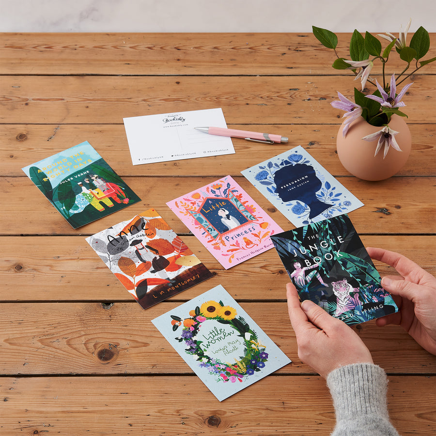 Set of 12 Book Cover Postcards illustrated by Bookishly. Book lover postcards. Bookish Gifts. Pen pal. Snail mail. Sending a postcard. Love letters. Booktok. Bookstagram. Postcards for bookworms, bibliophiles, readers. Booktok lovers.