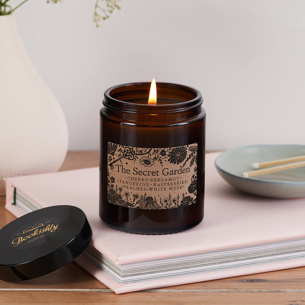 Luxury Vegan Candle. Soy wax Candle. Bookish Candle. Amber apothecary style jar. Apothecary. Hand Poured Signature Candle. Natural soy wax. Classic Literature. Reading Candle. Mary Lennox. The Secret Garden. Floral Candle. Florist. Gifts for Gardeners. Plants. Flowers. Frances Hodgson Burnett.