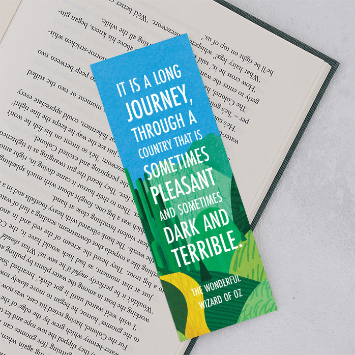 A blue and green bookmark with a quote from the Wonderful Wizard of Oz