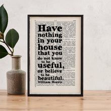 Framed book page art featuring the William Morris quote: “Have nothing in your house that you do not know to be useful, or believe to be beautiful.”